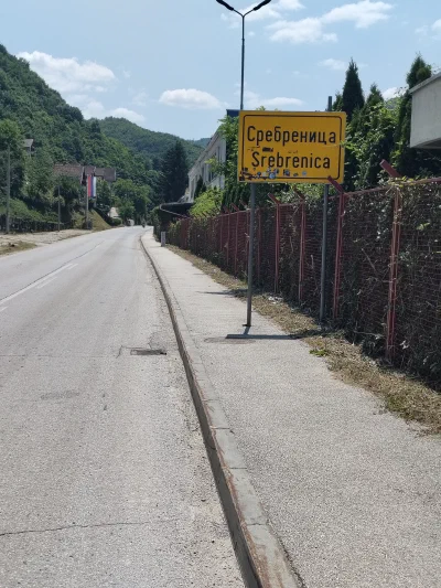 The sign that I am entering Srebrenica village